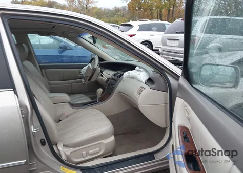 2003 Toyota Avalon Xls z USA, uszkodzony, nr VIN 4T1BF28B93U330589